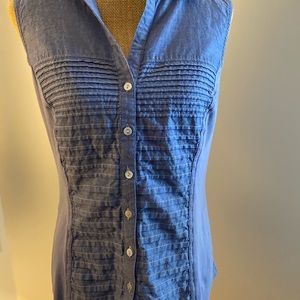 Sleeveless blue button down shirt. Size Large